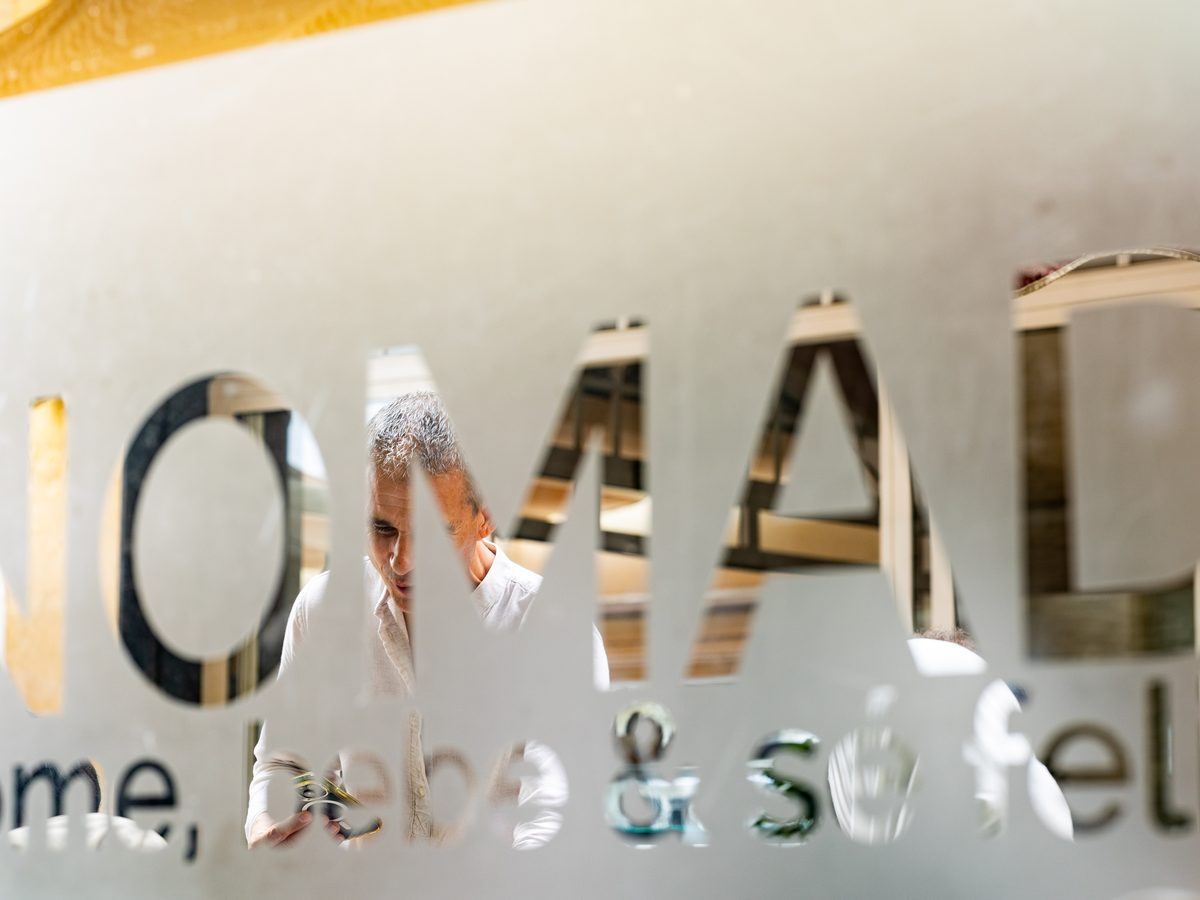 The Café Nomad lettering on the wall.